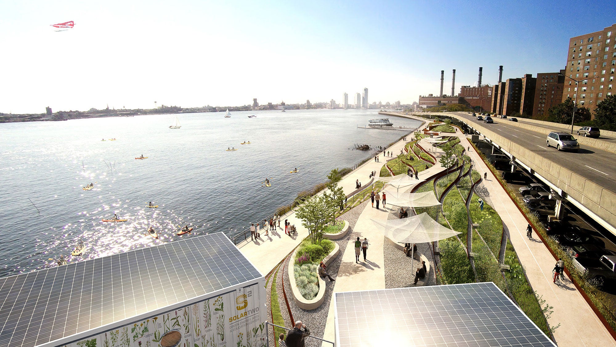 Aerial view of Stuyvesant Cove Park greenway with solar panels, native plants, and kayakers on the East River.