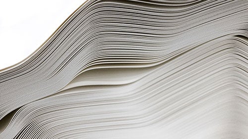Layers of roofing material stacked on top of each other