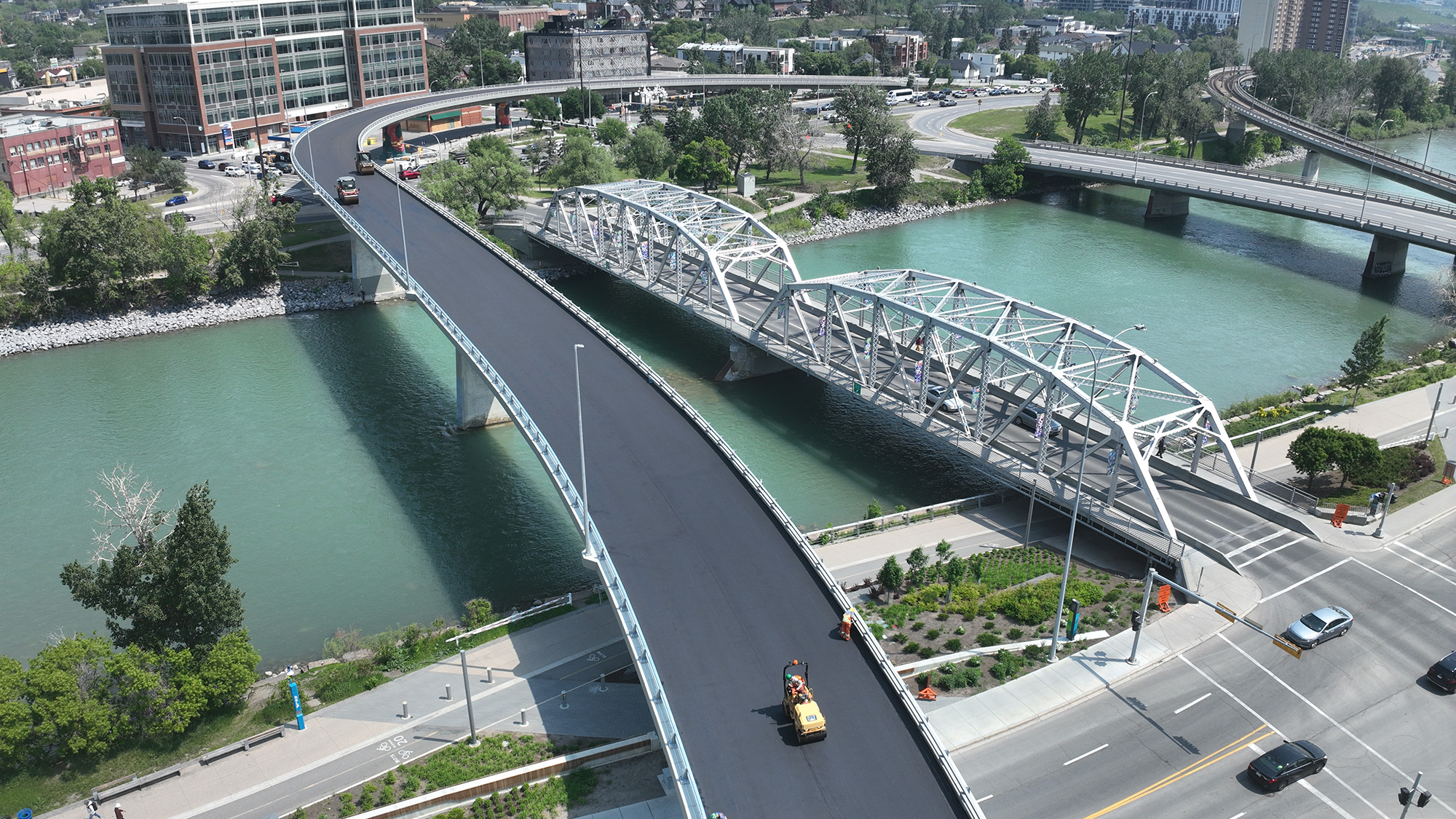 A freshly paved bridge over a river