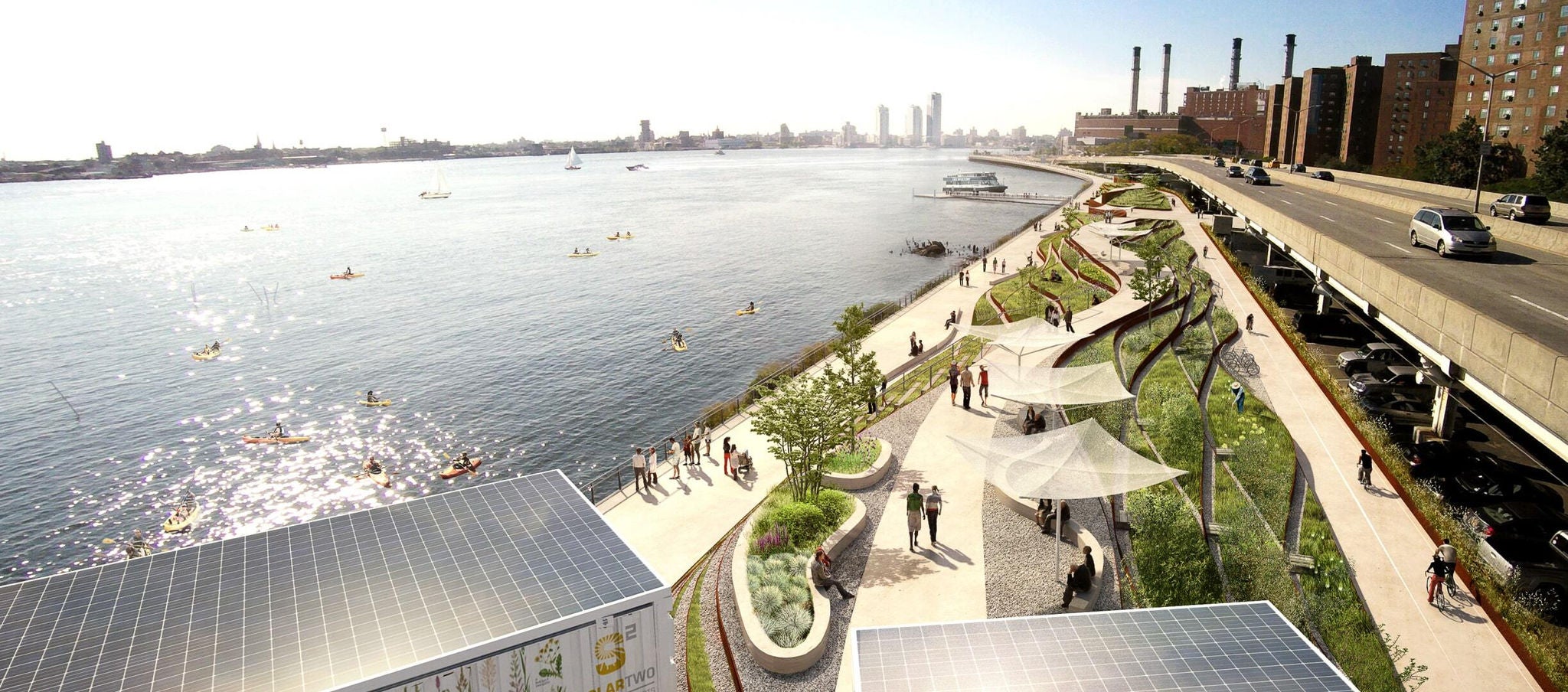 View of people recreating in a beautiful coastal park next to a highway in a big city