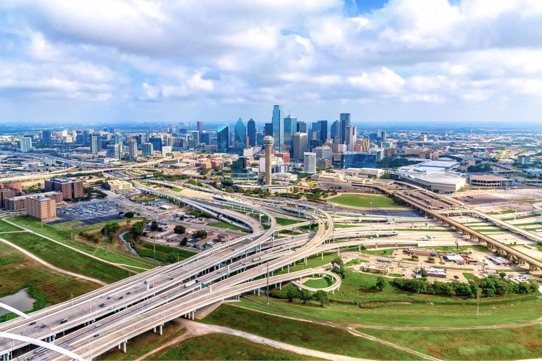 Sprawling highway system borders city skyscrapers along Highway 75 in Dallas, Texas