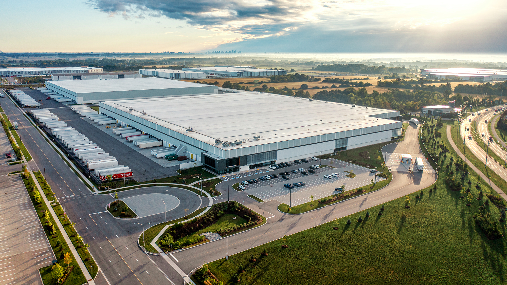 An aerial view of a data center at sunrise